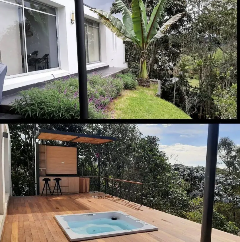 Terraza con jacuzzi y bar en madera